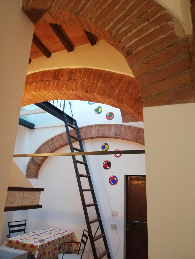 Fuga D'Archi Apartment Siena Bagian luar foto