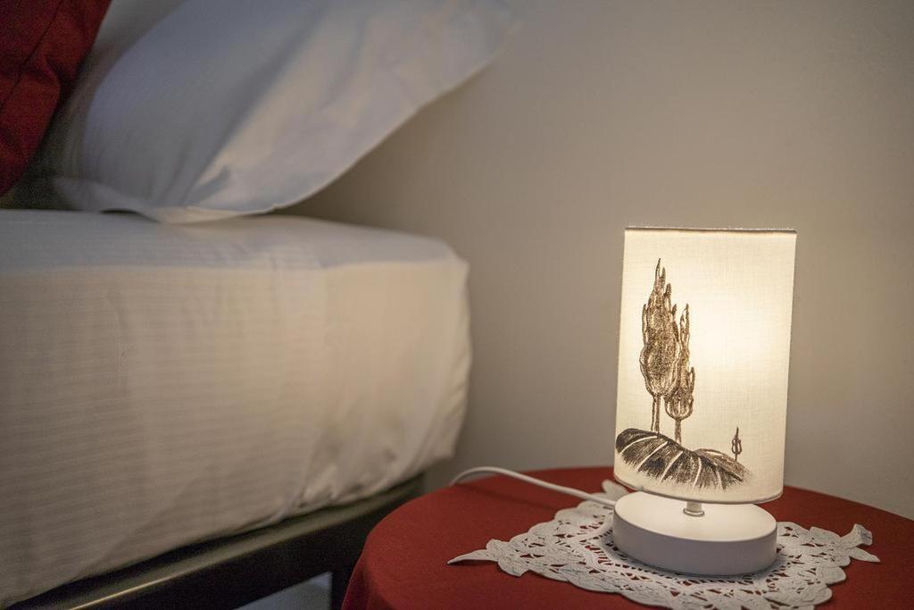 Fuga D'Archi Apartment Siena Bagian luar foto