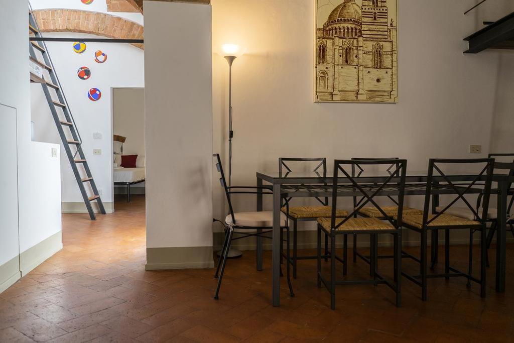 Fuga D'Archi Apartment Siena Bagian luar foto