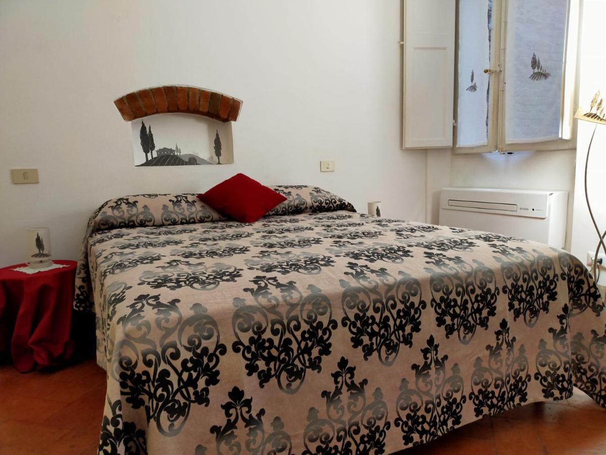 Fuga D'Archi Apartment Siena Bagian luar foto